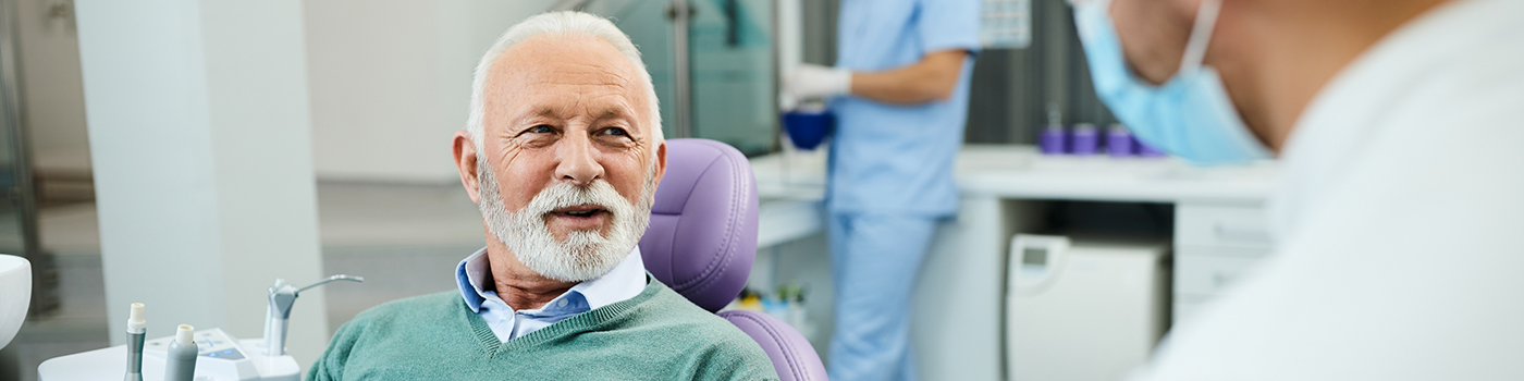 Bearded man in dental chair