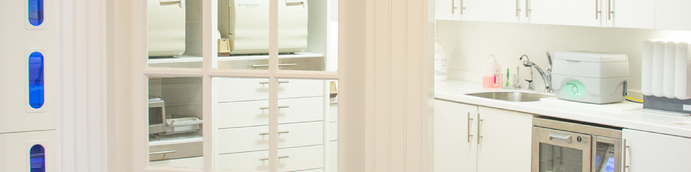 Door leading to room with cabinets