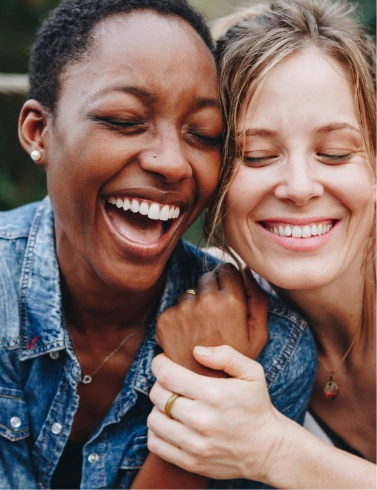 Laughing woman with smiling woman